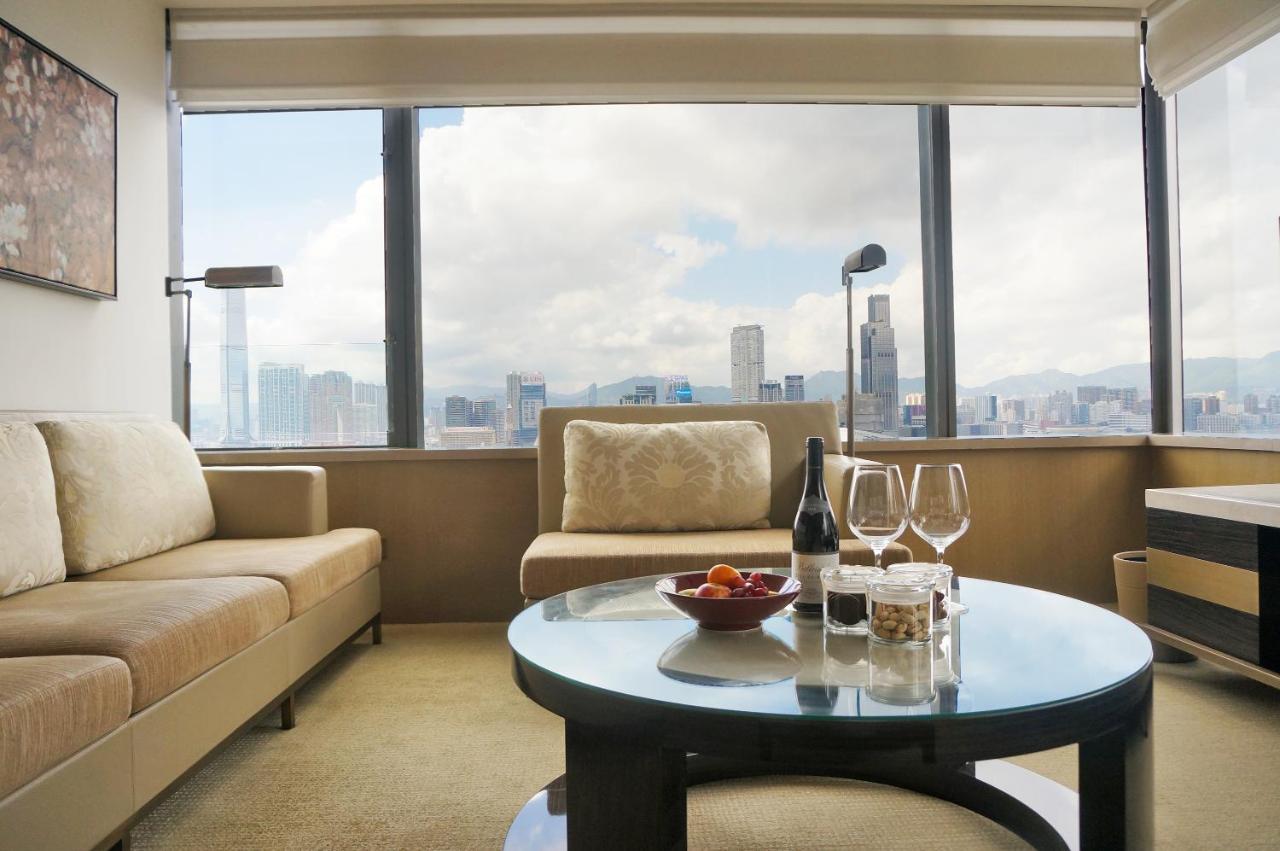 Grand Hyatt Hong Kong Hotel Exterior photo A living room in a suite at the Mandarin Oriental, Hong Kong