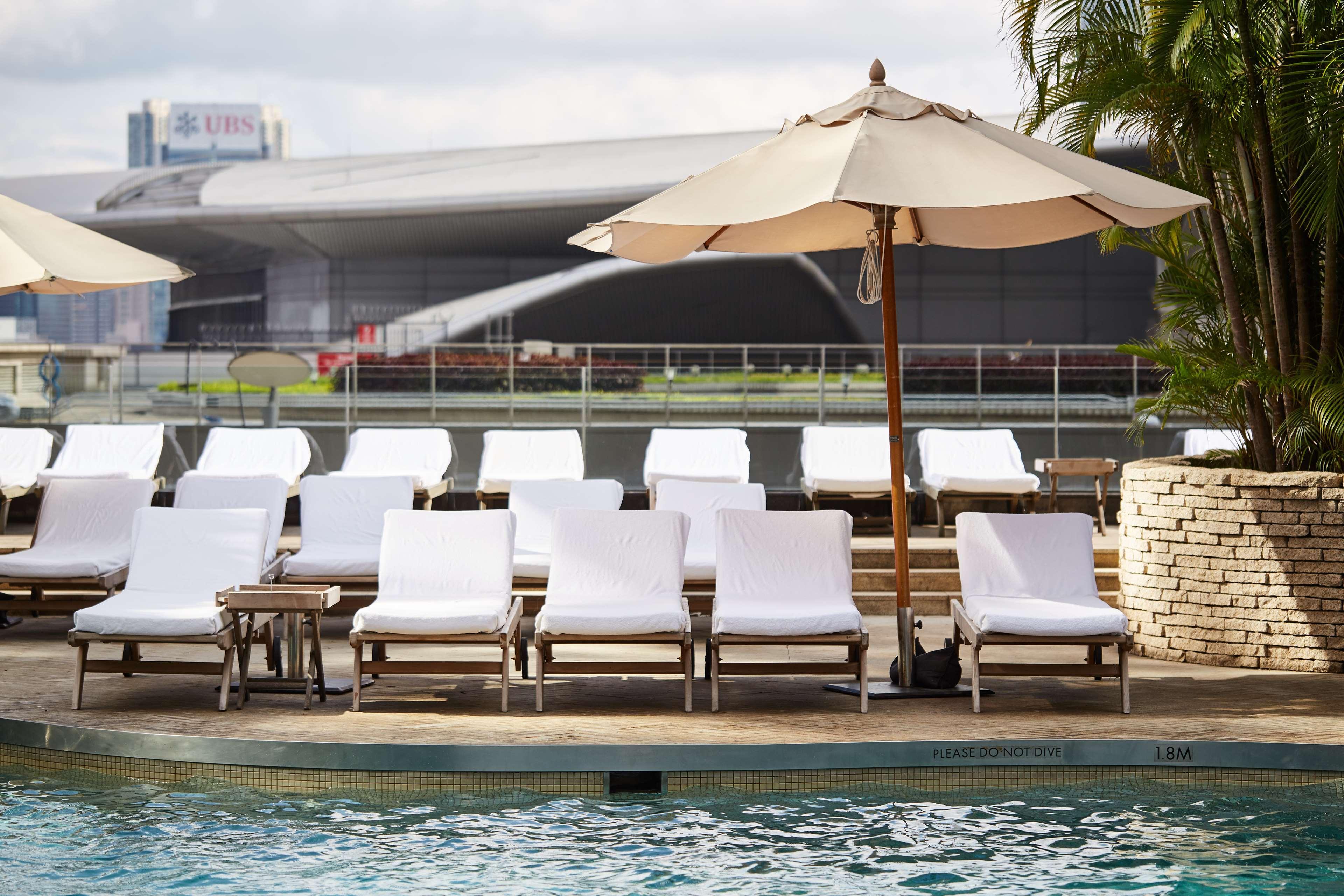 Grand Hyatt Hong Kong Hotel Exterior photo The pool deck at the Marina Bay Sands