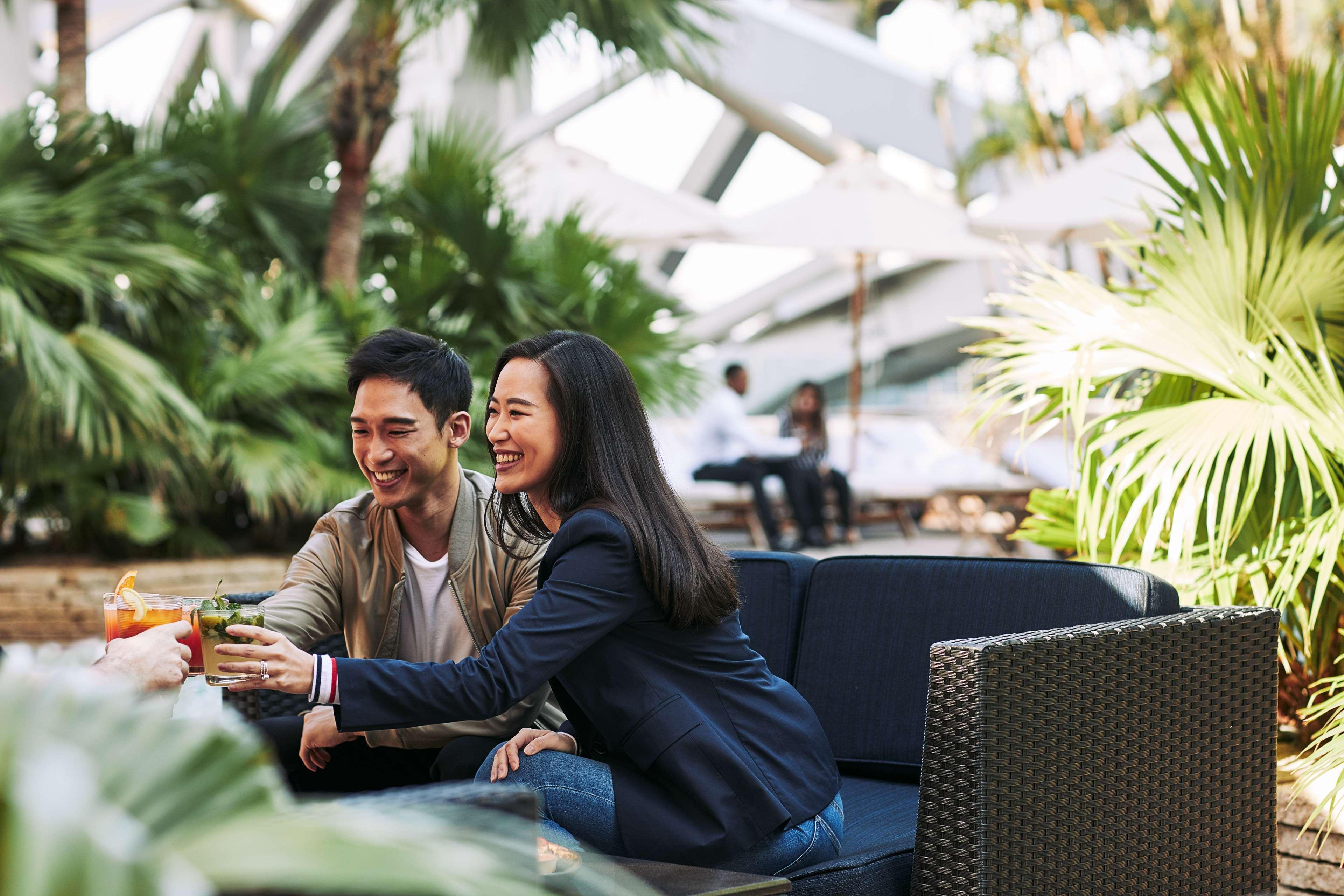 Grand Hyatt Hong Kong Hotel Exterior photo A couple at the airport